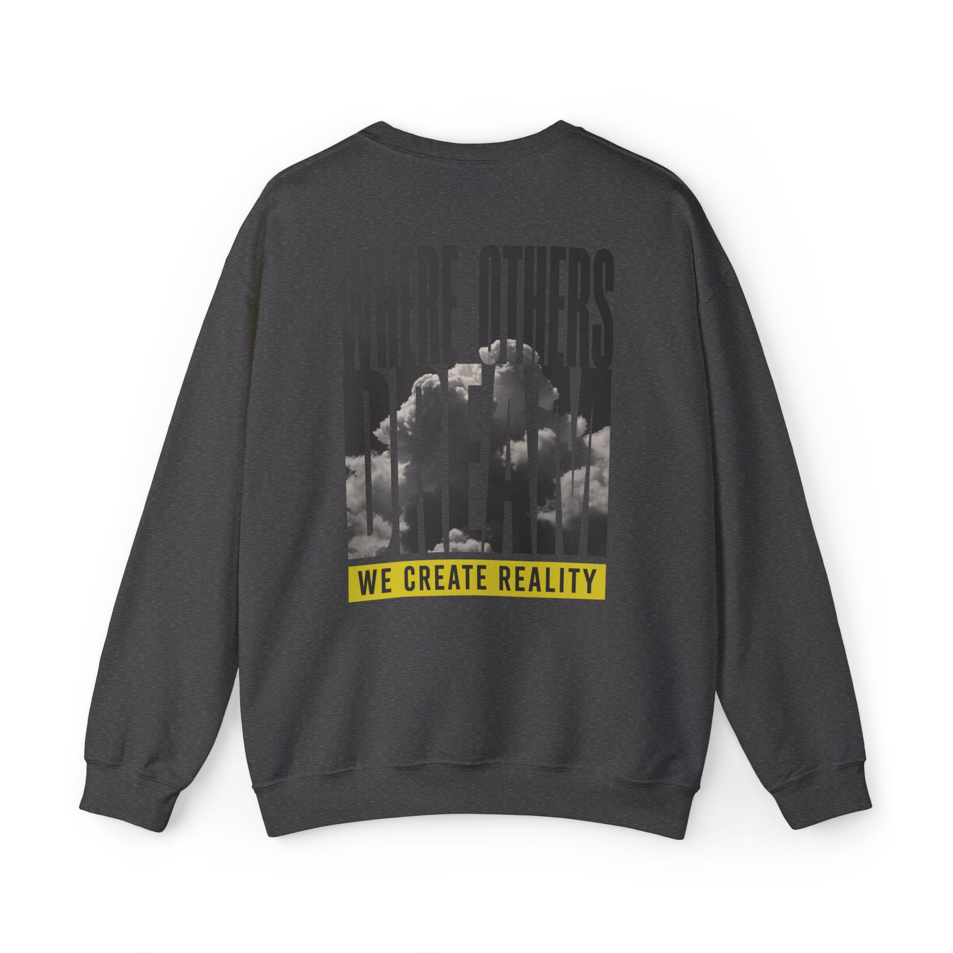 Back of the dark heather Where Others Dream Crewneck Sweatshirt with the city skyline graphic and yellow We Create Reality banner.