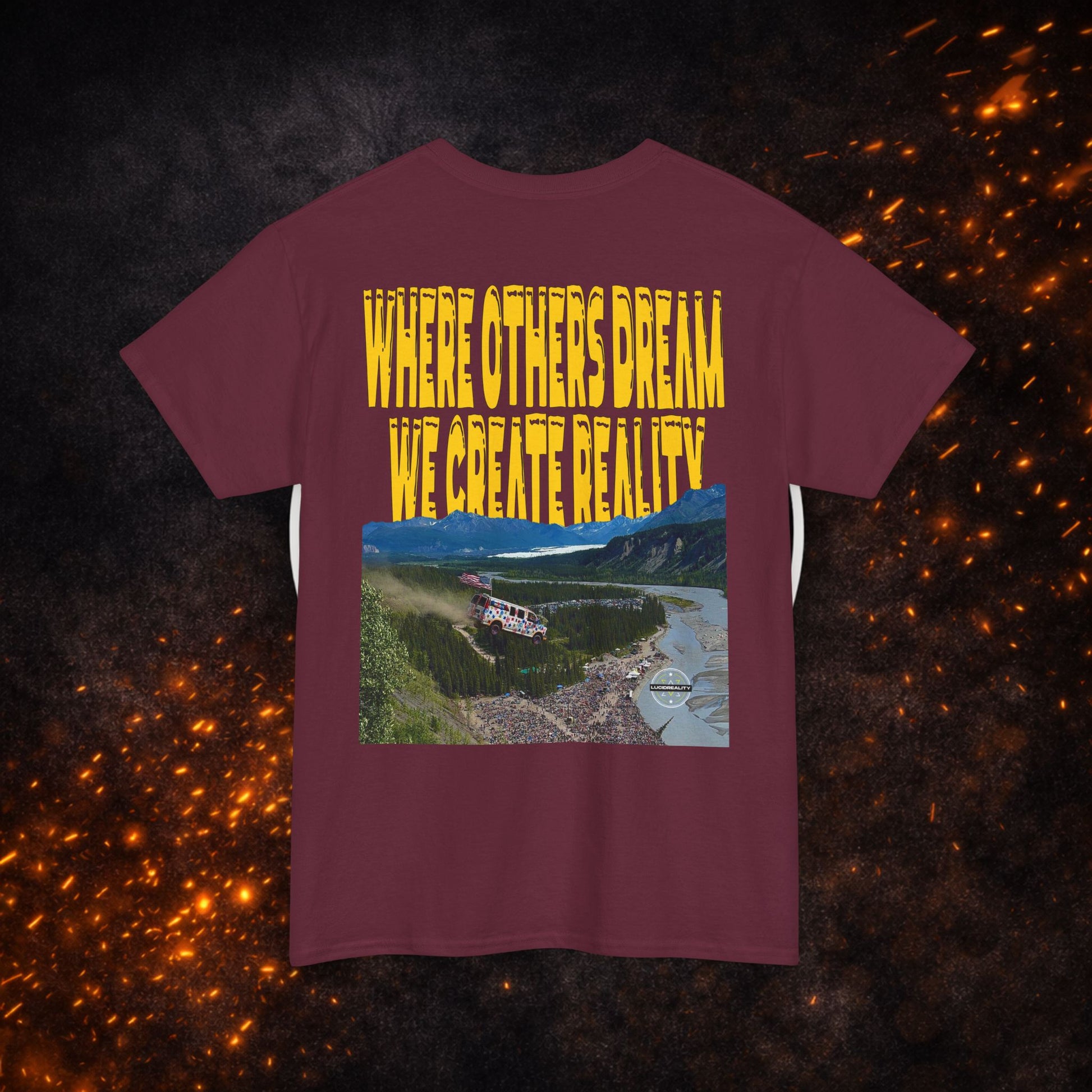 Back view of the maroon Lucid Reality Where Others Dream Tee showing the "Where Others Dream We Create Reality" yellow text above a mountain and river landscape graphic.