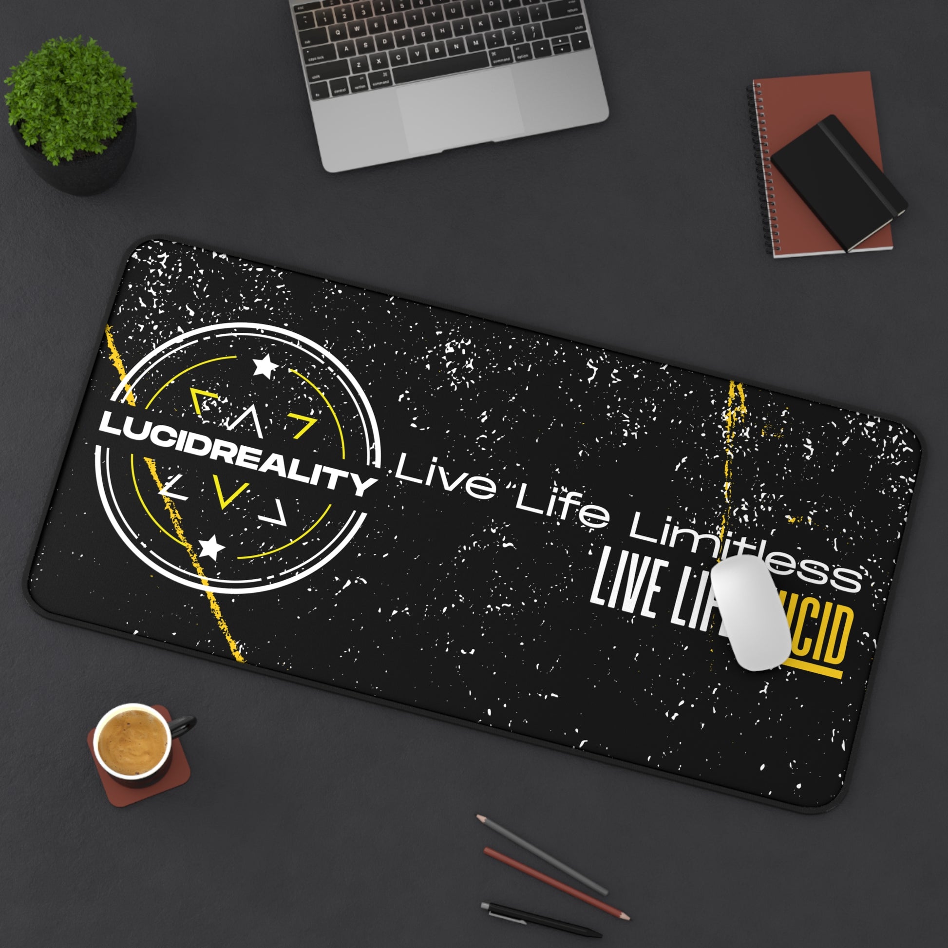 Live Life Limitless 16x32 desk mat styled on a desk with a laptop, notebook, and coffee