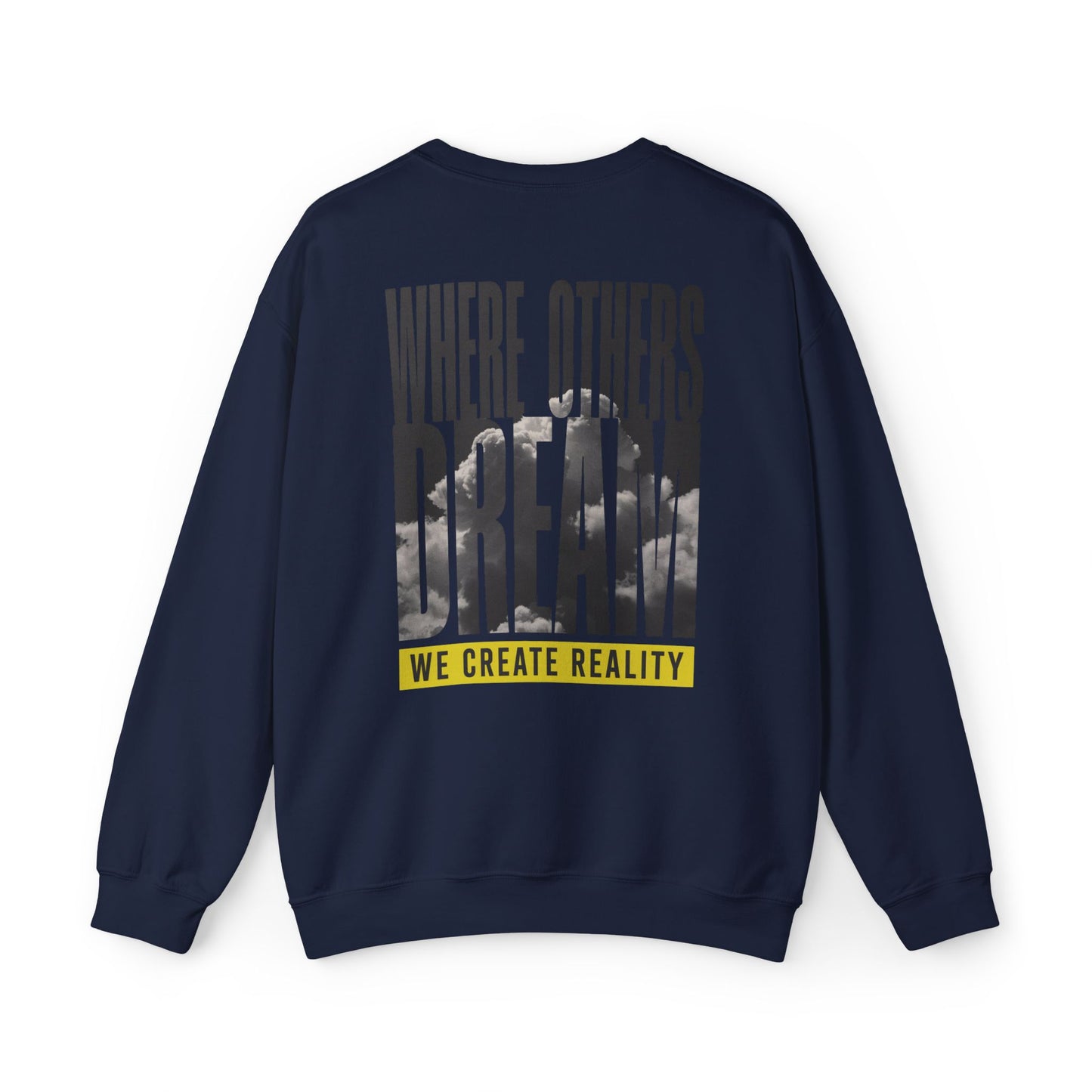 Back of the navy Where Others Dream Crewneck Sweatshirt with the city skyline graphic and yellow We Create Reality banner.