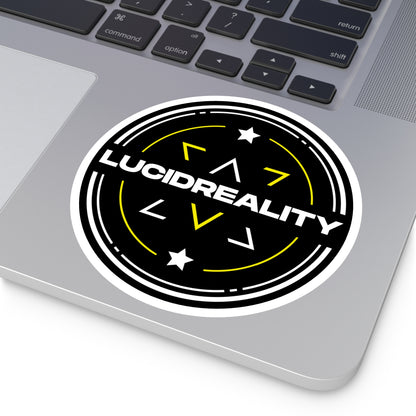 Lucid Reality circular logo sticker placed on a laptop surface.