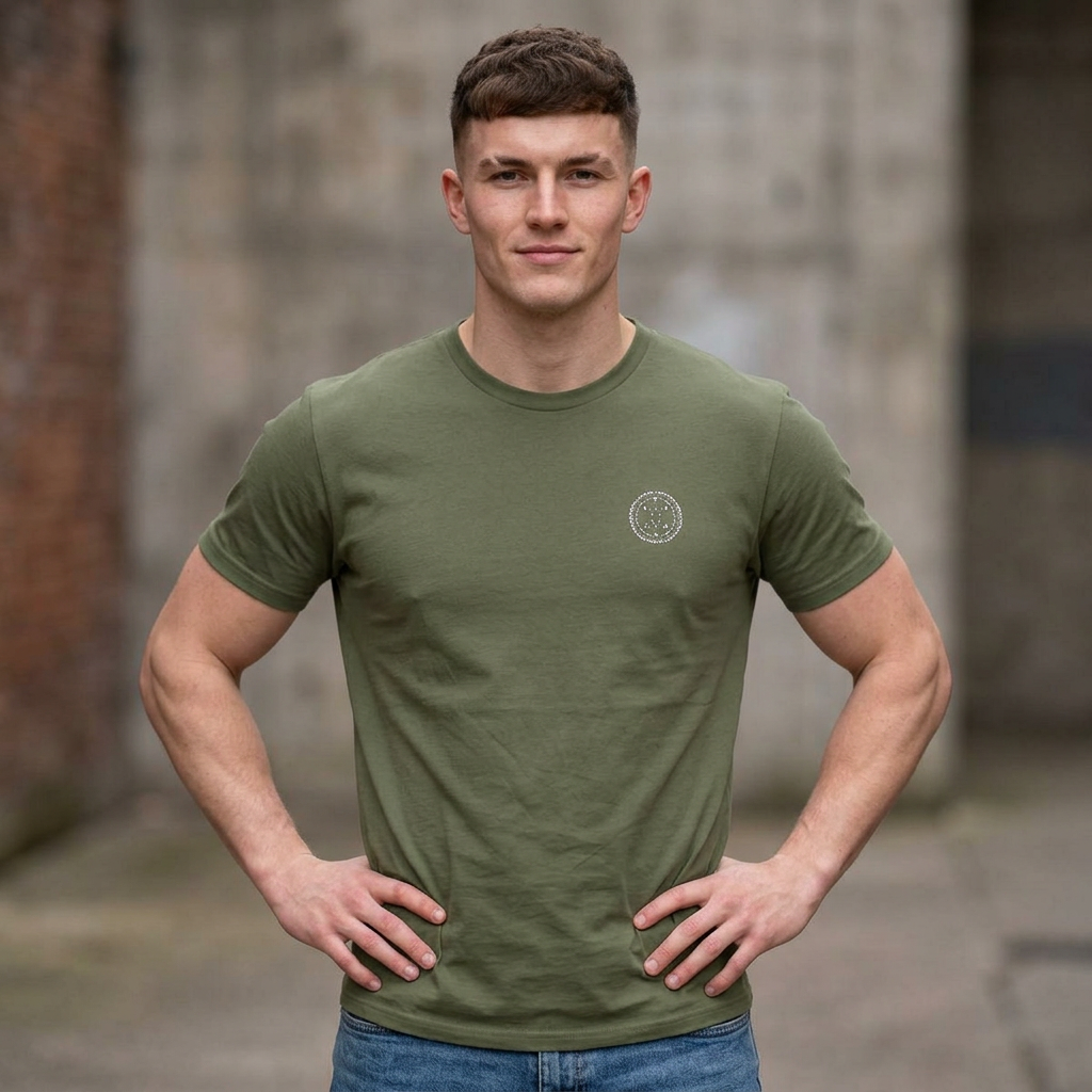 Athlete wearing the Lucid Reality Minimalist Embroidered Logo Tee in olive green with the small white embroidered logo on the front left chest.