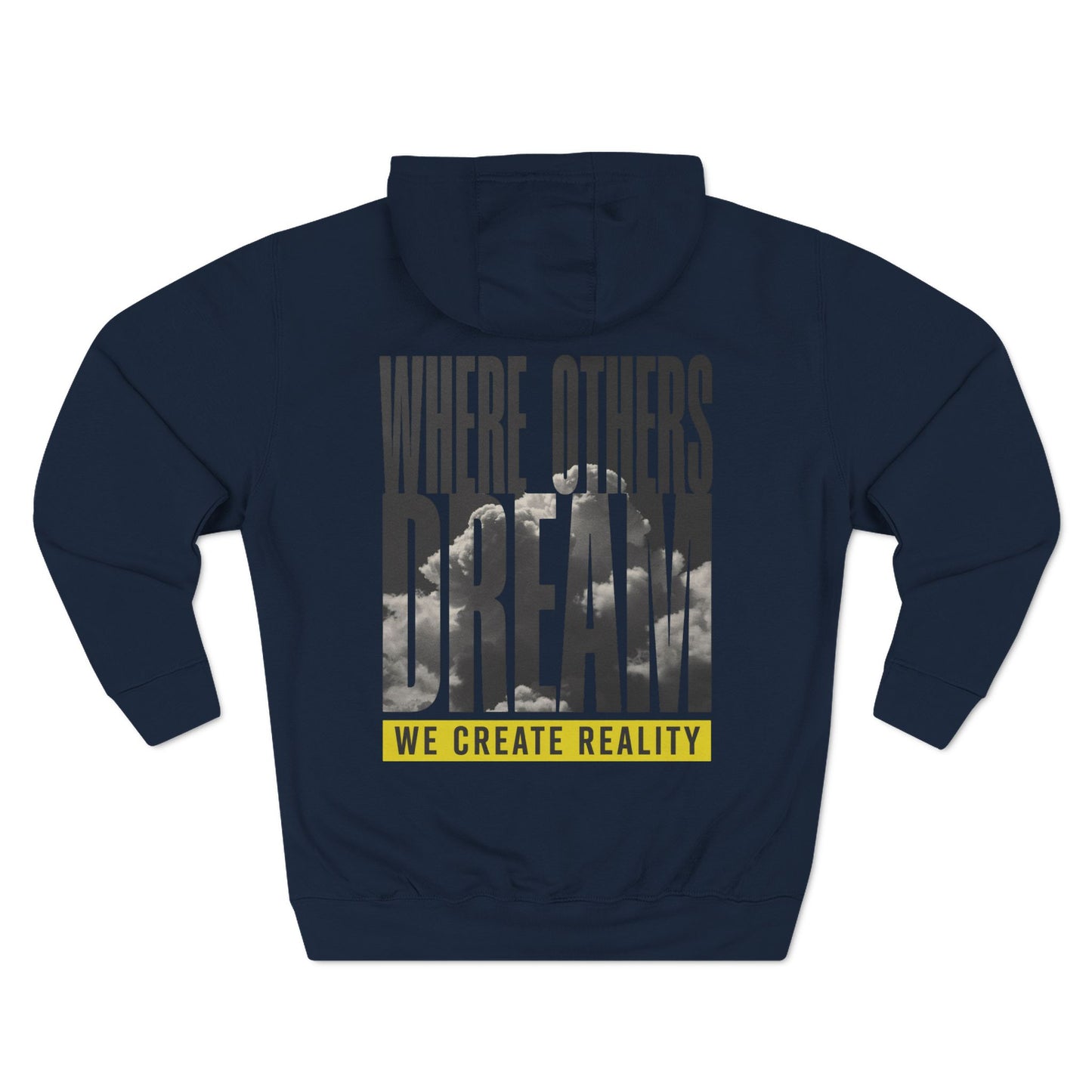 Back of the navy Where Others Dream Fleece Pullover Hoodie with the city skyline graphic and yellow We Create Reality banner.