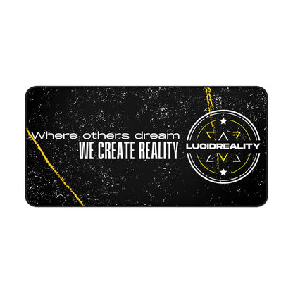 Where Others Dream desk mat, 16x32 inch, flat view of the Lucid Reality emblem with WHERE OTHERS DREAM, WE CREATE REALITY