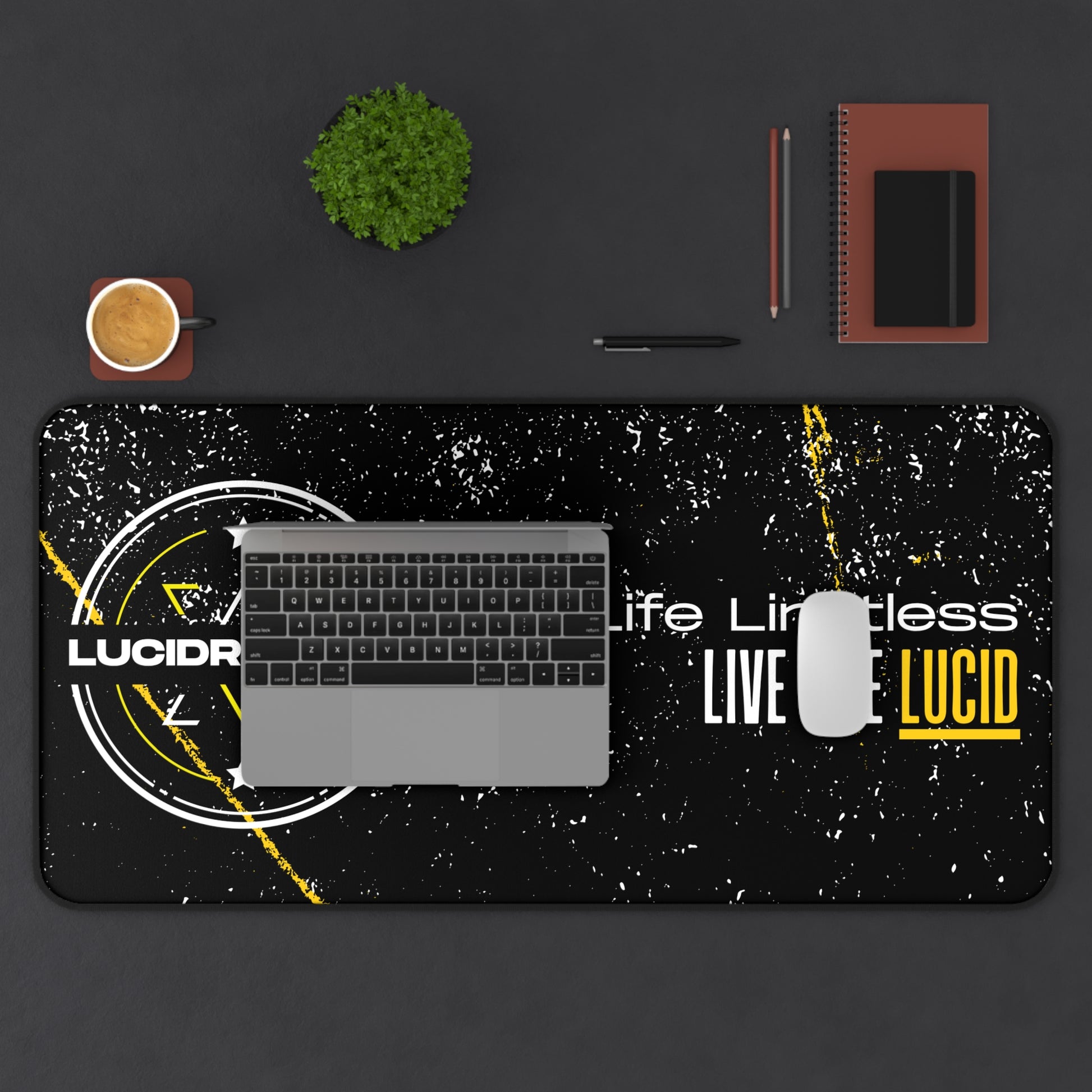 Live Life Limitless 16x32 desk mat, overhead view on a styled desk setup