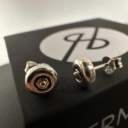 Sterling silver skateboard wheel stud earrings, curated by Lucid Reality