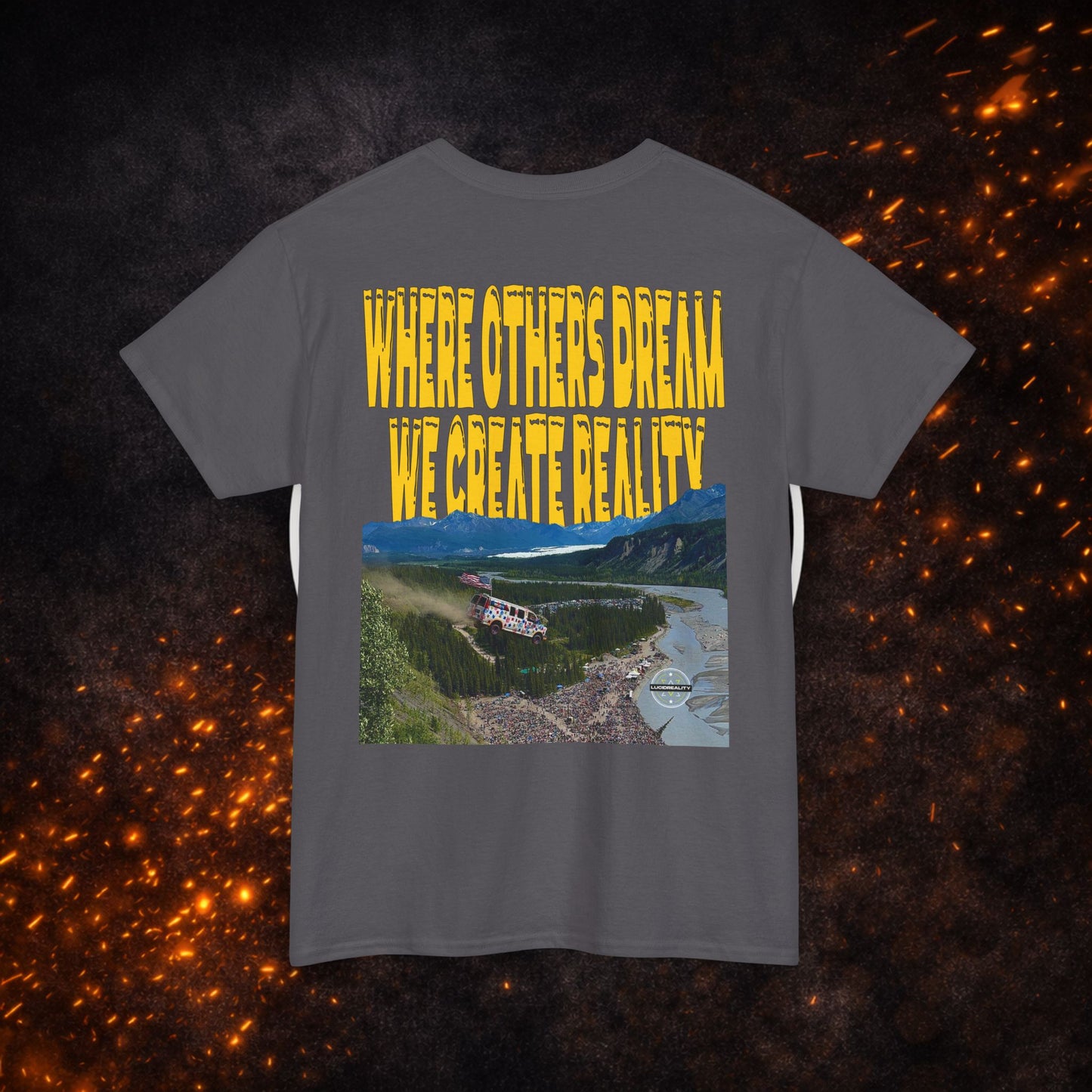 Back view of the charcoal Lucid Reality Where Others Dream Tee showing the "Where Others Dream We Create Reality" yellow text above a mountain and river landscape graphic.