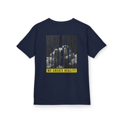 Navy Where Others Dream Kids Tee, back Where Others Dream We Create Reality graphic, flat lay