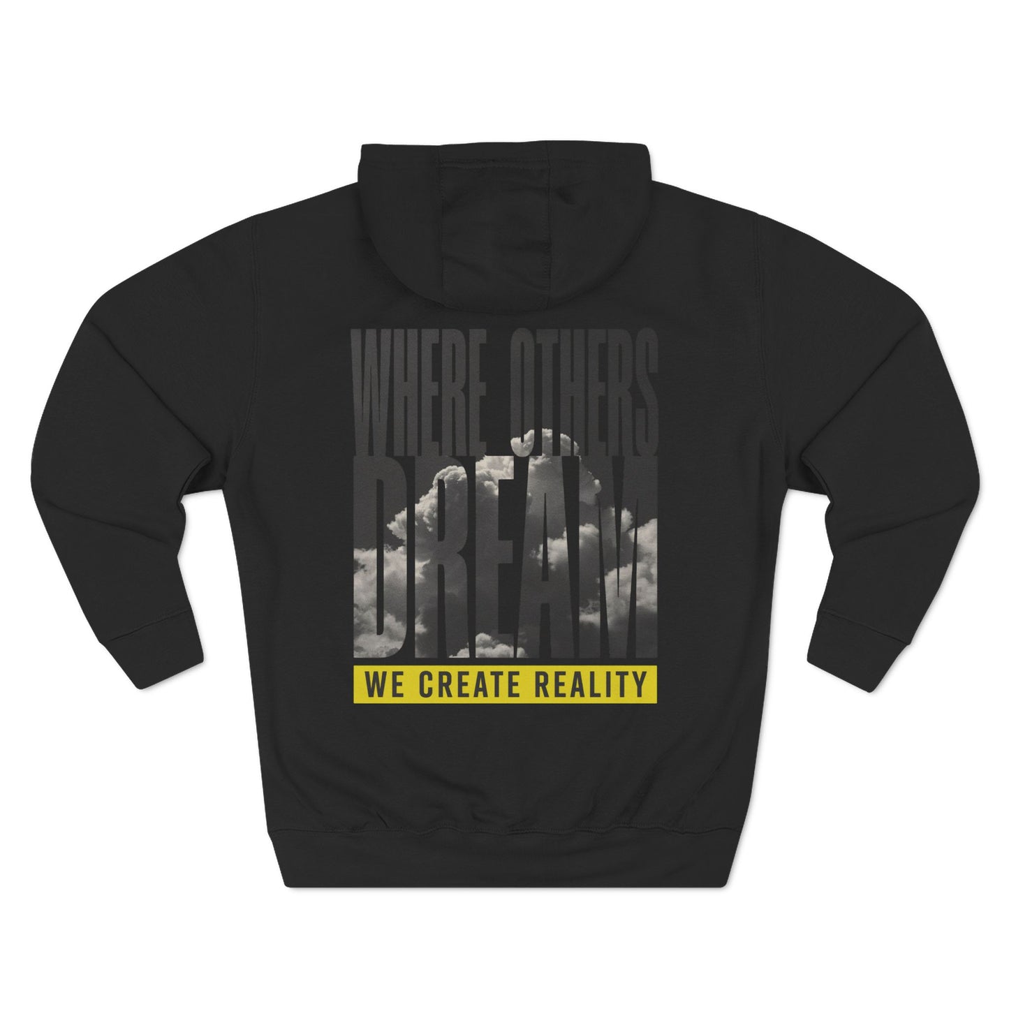 Back of the black Where Others Dream Fleece Pullover Hoodie with the city skyline graphic and yellow We Create Reality banner.