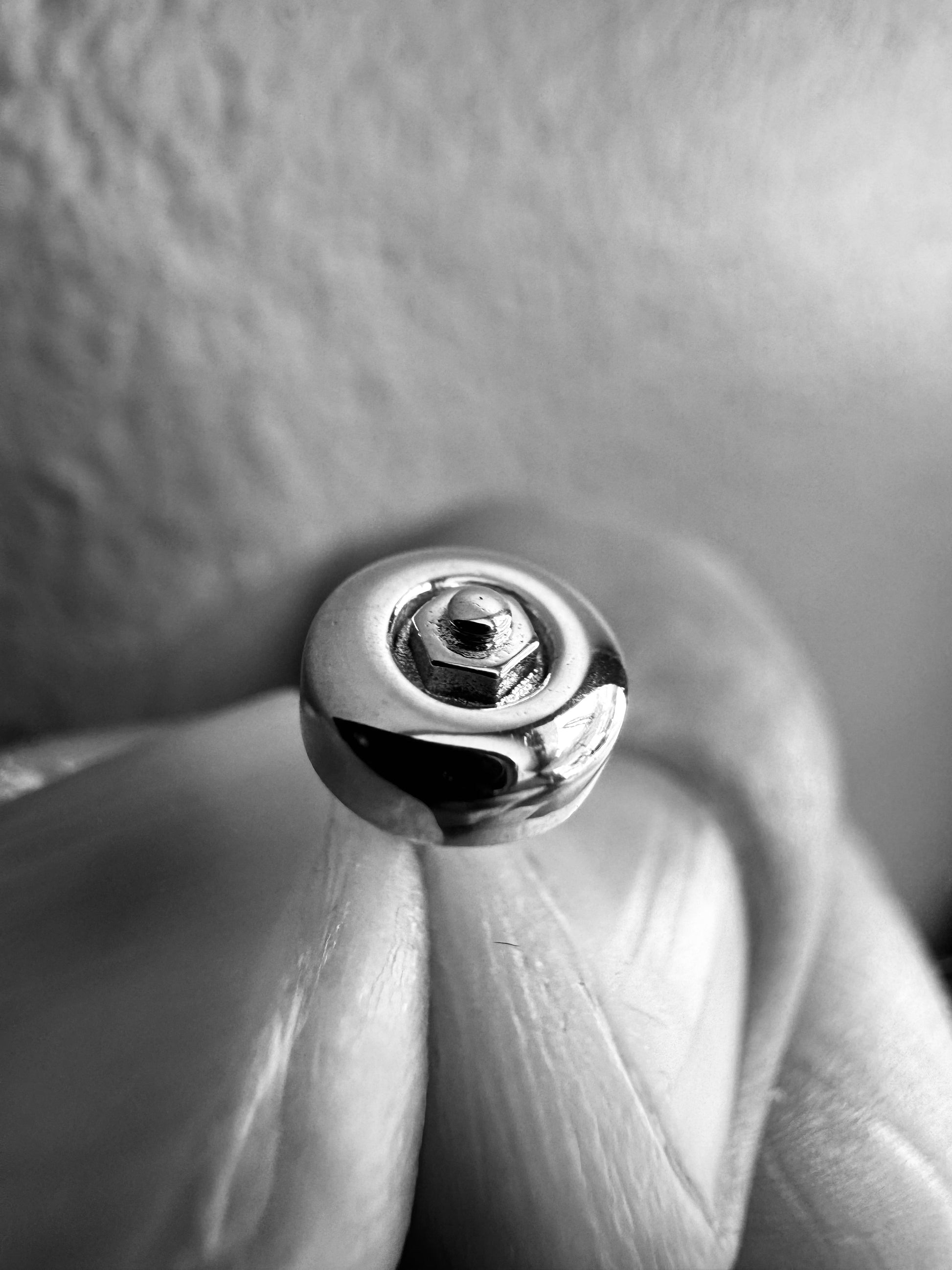 Sterling silver skateboard wheel stud earrings, curated by Lucid Reality