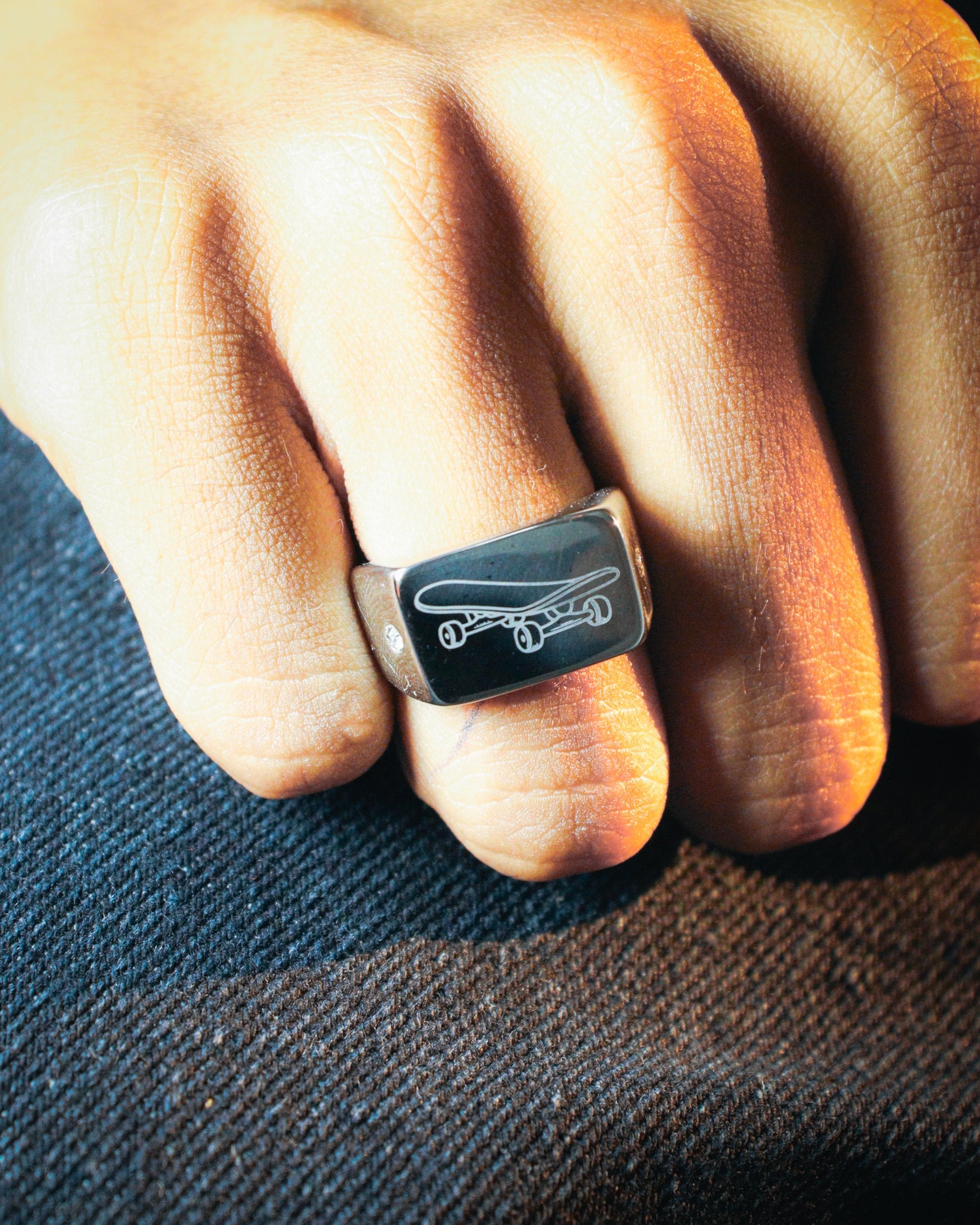 Sterling silver skateboard deck pendant with matching ring, curated by Lucid Reality