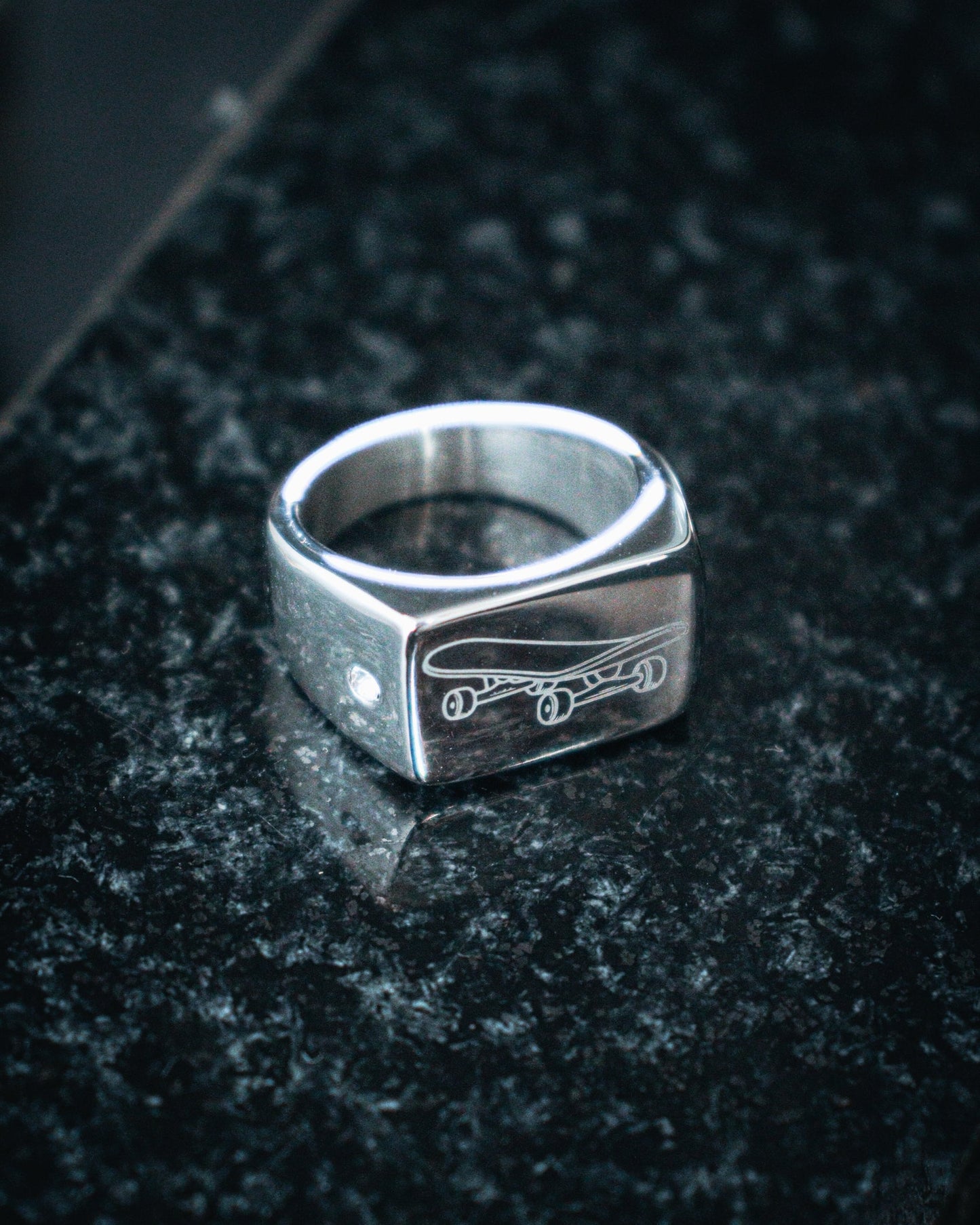 Sterling silver skateboard deck pendant with matching ring, curated by Lucid Reality