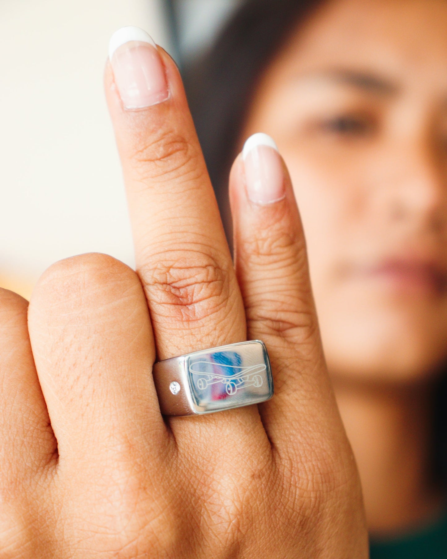 Sterling silver skateboard deck pendant with matching ring, curated by Lucid Reality